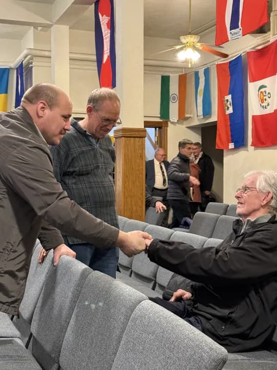 Men fellowshipping together