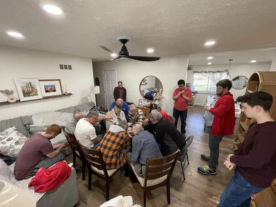 Praying together at the men's breakfast